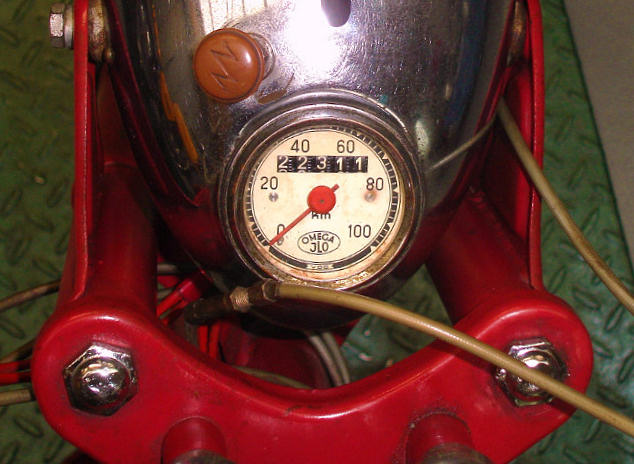 Belgian Omega motorcycle speedometer with logo, 1952